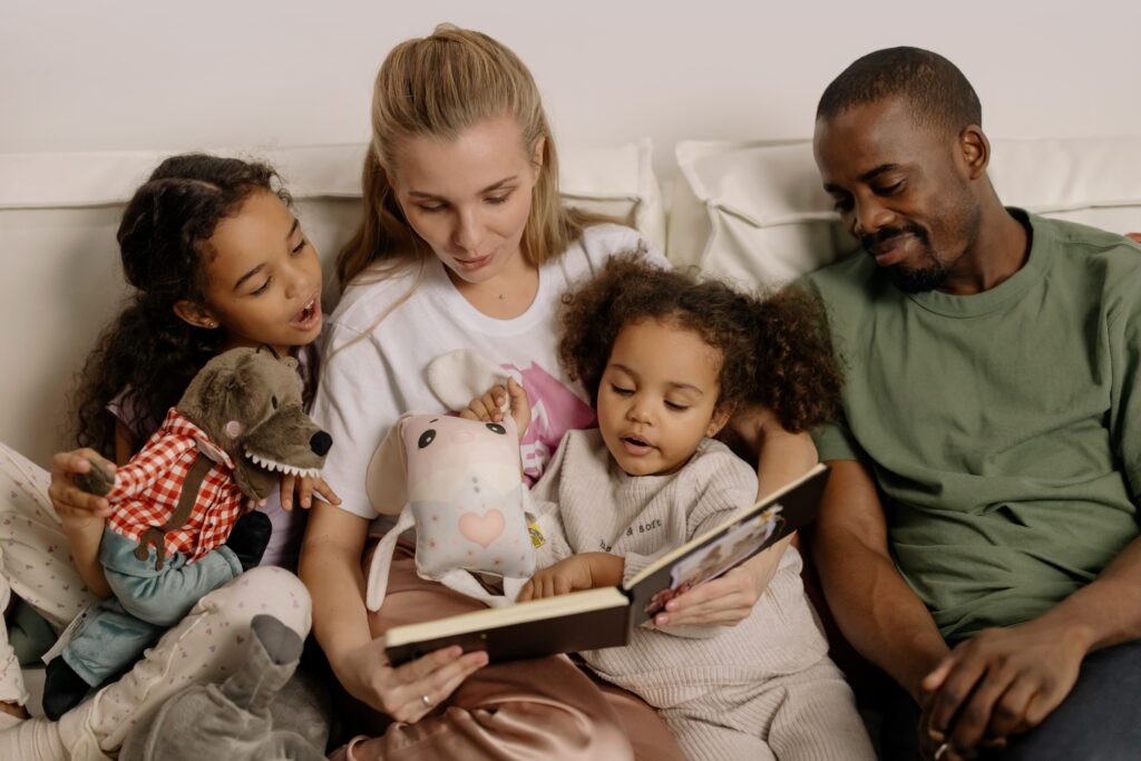 Parents reading to their children.