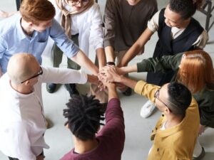 All Hands In Group Huddle